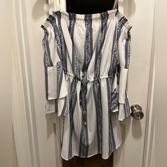 Blush off the shoulder mini dress. - Picture 1 of 3